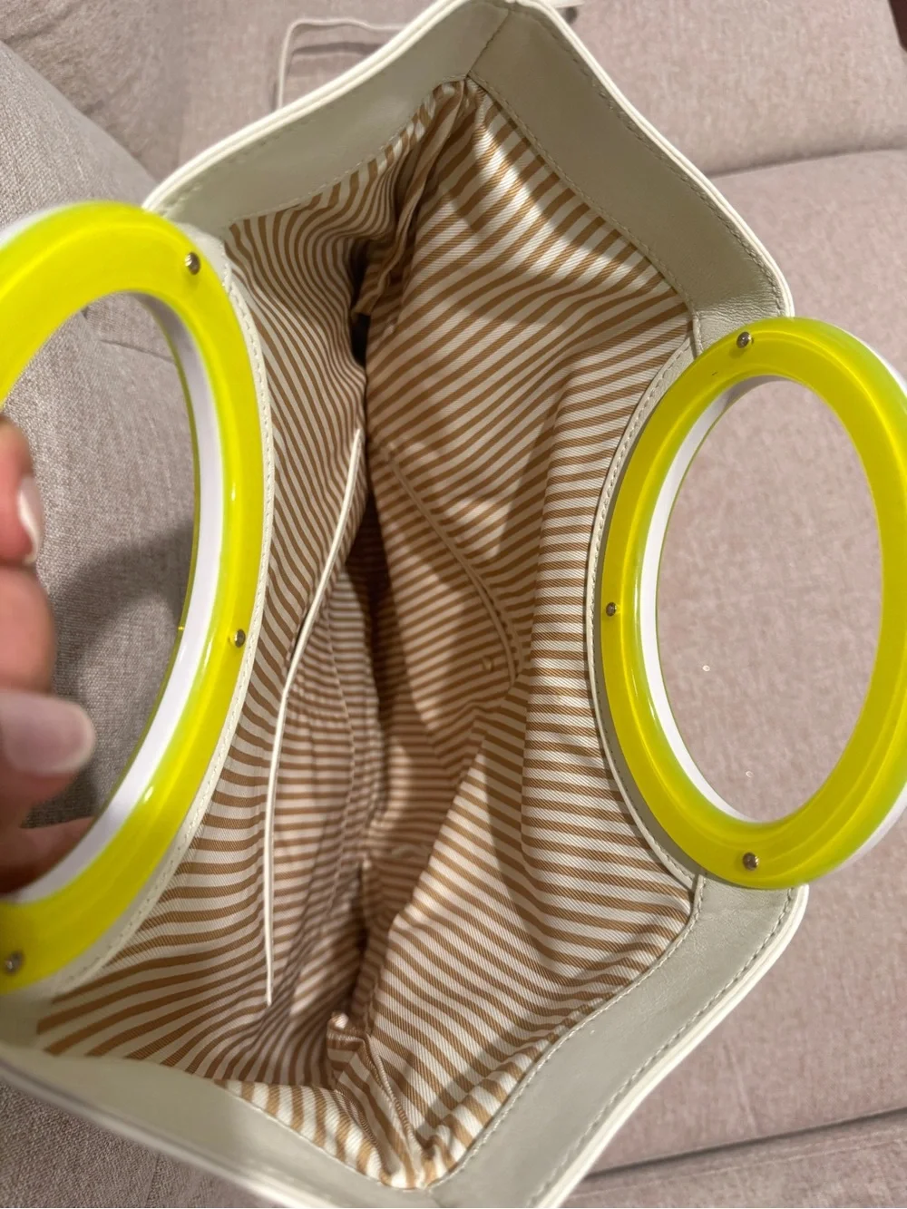 kate spade Cream Leather Tote with Yellow Circular Handle Accent